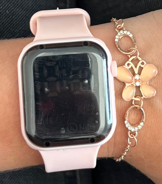 Montre digitale rose et son bracelet